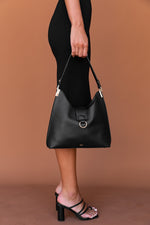 Load image into Gallery viewer, Woman&#39;s black vegan handbag
